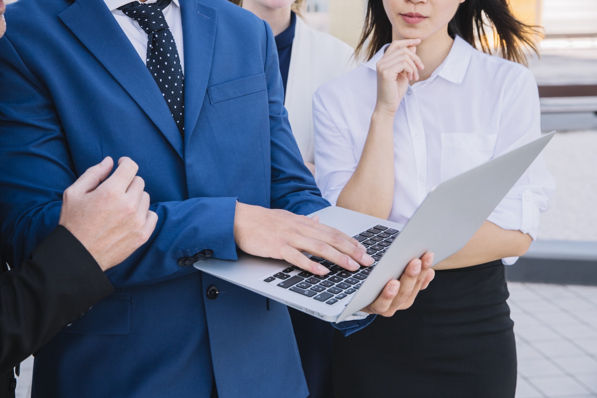 business-people-holding-laptop